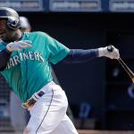 The Mariners&rsquo; Guillermo Heredia bats during the third inning of a spring training game against the Padres on Feb. 26, 2017, in Peoria, Ariz. (AP Photo/Charlie Riedel)