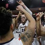 Gonzaga&rsquo;s Przemek Karnowski, center, celebrates with teammates after defeating Saint Mary&rsquo;s in an NCAA college basketball game during the championship of the West Coast Conference tournament, Tuesday, March 7, 2017, in Las Vegas. Gonzaga won 74-56. (AP Photo/John Locher)