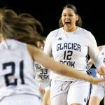 Glacier Peak&rsquo;s Kayla Watkins (12) celebrates with teammates after a come-from-behind win over Sunnyside in a 4A state tournament game March 2, 2017, at the Tacoma Dome. Glacier Peak won 48-47. (Kevin Clark / The Herald)