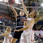Glacier Peak&rsquo;s Samantha Fatkin attempts a shot with Moses Lake&rsquo;s Jessica Olson defending during a 4A state tournament semifinal game on March 3, 2017, at the Tacoma Dome. Glacier Peak won 55-51 to advance to the state finals. (Kevin Clark / The Herald)