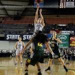 Glacier Peak&rsquo;s Samantha Fatkin (5) attempts a shot over Kentridge&rsquo;s Tresai McCarver during the 4A state championship game March 4, 2017, at the Tacoma Dome. (Kevin Clark / The Herald)