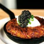 These rosti potatoes   with clabber cream and paddlefish caviar are made using mini frying pans at Seattle&rsquo;s Lark restaurant. (Zack Bent photo)