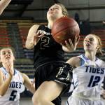 Lynnwood&rsquo;s Reilly Walsh attempts a shot with Gig Harbor&rsquo;s Abby Nordquist, left, and Emily Shields trailing during the 2017 3A Hardwood Classic state tournament Wednesday morning at the Tacoma Dome on March 1, 2017. (Kevin Clark / The Herald)