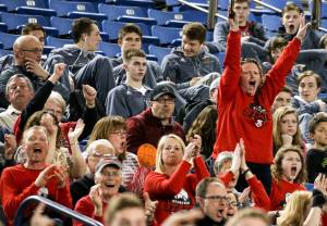 Stanwood fans cheer on the boys basketball team during the 2017 3A Hardwood Classic state tournament Wednesday night at the Tacoma Dome. Stanwood defeated Shorecrest 64-52. (Kevin Clark / The Herald)