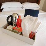 In this March 23 photo at the Sheraton Boston Hotel, items that many Chinese travelers expect in their rooms include an electric kettle, green tea, instant noodles, slippers and a robe. (AP Photo/Steven Senne)