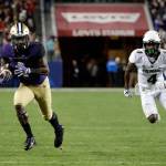 Washington wide receiver John Ross (left) runs for a touchdown next to Colorado defensive back Chidobe Awuzie (right) during the the Pac-12 championship game Friday, Dec. 2, 2016, in Santa Clara, Califorina. (AP Photo/Marcio Jose Sanchez)