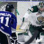 Victoria&rsquo;s Matthew Phillips takes a shot at goal with Everett&rsquo;s Carter Hart defending in the second period of a playoff game on March 25, 2017, at Xfinity Arena in Everett. (Kevin Clark / The Herald)