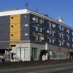The Patrick Place low-barrier apartments are seen on Aurora Avenue North in Seattle. (Ian Terry / The Herald)