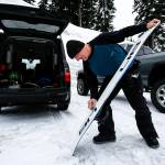 Pete Saari, co-founder of Lib Technologies and Gnu snowboard manufacturers, applies wax to his snowboard before heading out with friend Dave Marx for a few runs at Stevens Pass on Wednesday, March 22. Saari&rsquo;s company, based in Sequim, focuses on handmade and sustainably built snowboard, ski, surf and skateboard equipment. (Ian Terry / The Herald)