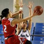 Kennedy Catholic&rsquo;s Emilio Mancol (left) attempts a shot over Glacier Peak&rsquo;s Justin Purcell during the 2017 4A Hardwood Classic state tournament Wednesday morning at the Tacoma Dome. (Kevin Clark / The Herald)