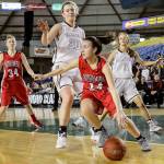 Snohomish&rsquo;s Emily Preach dribbles the ball with Mercer Island&rsquo;s Anna Luce defending a 3A Hardwood Classic semifinal game Friday at the Tacoma Dome. Snohomish lost to Mercer Island 60-51. (Kevin Clark / The Herald)
