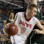 Stanwood&rsquo;s Chase Strieby attempts to get around Shorecrest&rsquo;s defense during a 3A Hardwood Classic tournament game March 1 at the Tacoma Dome. Stanwood defeated Shorecrest 64-52. (Kevin Clark / The Herald)