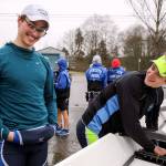Ethan Grice and Chase Barrows share a laugh before practice Thursday at the Everett Rowing Association boathouse. (Kevin Clark / The Herald)