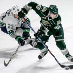 Everett&rsquo;s Connor Dewar controls the puck with Seattle&rsquo;s Luke Ormsby trailing during a game March 10, 2017, at ShoWare Center in Kent. (Kevin Clark / The Herald)