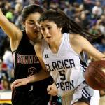 Glacier Peak&rsquo;s Samantha Fatkin drives the lane with Sunnyside&rsquo;s Chastitee Garza defending during the 2017 4A Hardwood Classic state tournament Thursday night at the Tacoma Dome on March 02, 2017. Glacier Peak won 48-47.(Kevin Clark / The Herald)