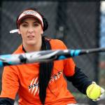 Monroe softball player Morgan Allen tosses a pitch during practice March 10. (Kevin Clark / The Herald)