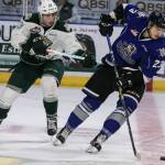 Everett&rsquo;s Connor Dewar battles Victoria&rsquo;s Vladimir Bobylev in the second period of a playoff game on march 25, 2017, at Xfinity Arena in Everett. (Kevin Clark / The Herald)
