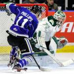 Victoria&rsquo;s Matthew Phillips takes a shoat at goal with Everett&rsquo;s Carter Hart defending during a playoff game March 31, 2017, at Xfinity Arena in Everett. (Kevin Clark / The Herald)