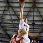 Nathan Hale&rsquo;s Michael Porter Jr. dunks over Stanwood&rsquo;s Bryson Kelley during the a 3A state tournament game March 2, 2017, at the Tacoma Dome. (Kevin Clark / The Herald)