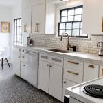 The Leonards&rsquo; kitchen features quartz countertops and a marble backsplash. Kippi Leonard designed and tiled the backsplash herself. (Kevin Clark / The Herald)