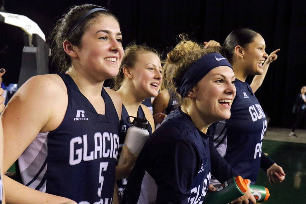 Glacier Peak players after beating Moses Lake in the 2017 4A Hardwood Classic state tournament Friday night at the Tacoma Dome. (Kevin Clark / The Herald)