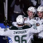 Everett&rsquo;s Dominic Zwerger, Matt Fonteyne (center) and Patrick Bajkov (right) celebrate a goal in the first period of a playoff game on March 25, 2017, at Xfinity Arena in Everett. (Kevin Clark / The Herald)