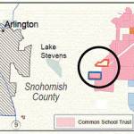 Common School Trust parcel outlined in blue would be exchanged for privately owned parcel outlined in red. (Dept. of Natural Resources)
