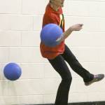 Kelcy Jacobsen dodges a ball at the Monroe Boys and Girls Club on March 11. Kevin Clark / The Herald)