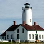 The New Dungeness Light Station at the end of a 5-mile sand spit on the Strait of Juan de Fuca near Sequim is rented by the week. Guests do light lighthouse keeping duties such as leading tours, making journal entries and raising the flag. (Rose Erickson)