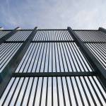 A section of the border fence along the U.S.-Mexico border in Brownsville, Texas. As a billionaire business tycoon, Donald Trump forged deals to acquire or develop casinos, luxury condo towers and lush golf courses. Now, as president, Trump aims to build perhaps his most ambitious and certainly his most contentious structure yet: A wall along the nearly 2,000-mile border between the United States and Mexico. (Jason Hoekema/The Brownsville Herald)