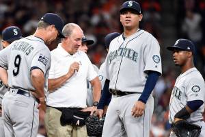 M’s offense shut down in opener; Hernandez hurt