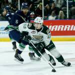 Silvertips center Connor Dewar maneuvers past Seattle&rsquo;s Aaron Hyman (6) during the first game of their second-round playoff series on April 7, 2017, at Xfinity Arena in Everett. (Ian Terry / The Herald)
