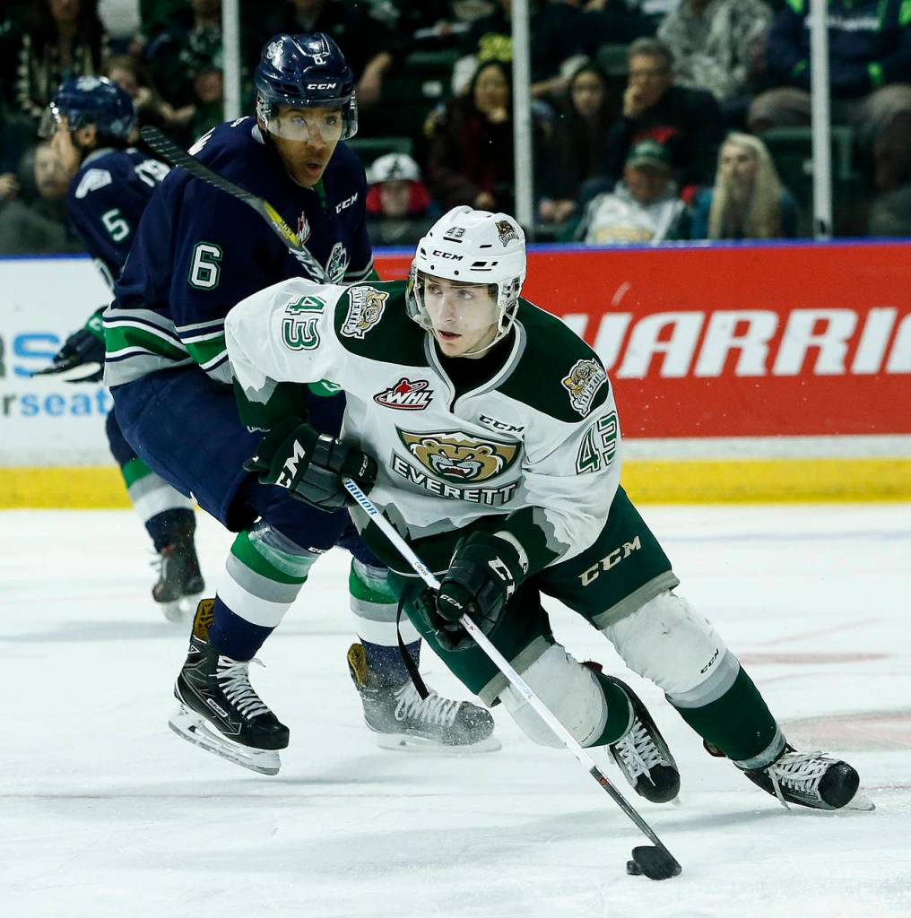Silvertips center Connor Dewar maneuvers past Seattle&rsquo;s Aaron Hyman (6) during the first game of their second-round playoff series on April 7, 2017, at Xfinity Arena in Everett. (Ian Terry / The Herald)