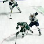 Silvertips left wing Dominic Zwerger (bottom) skates past the Thunderbirds&rsquo; Mathew Barzal (right) and Reece Harsch (top) during Game 3 of a second-round playoff series on April 11, 2017, at the ShoWare Center in Kent. (Ian Terry / The Herald)