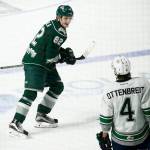 Silvertips right wing Eetu Tuulola (82) smiles at the Thunderbirds&rsquo; Turner Ottenbreit (4) after scoring late in the second period during Game 3 of a second-round playoff series on April 11, 2017, at the ShoWare Center in Kent. (Ian Terry / The Herald)