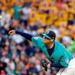 Mariners pitcher Felix Hernandez throws a pitch Friday in Seattle. (AP Photo/Elaine Thompson)
