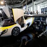 AeroMobil display their latest prototype of a flying car in Monaco on Thursday. (AP Photo/Claude Paris)