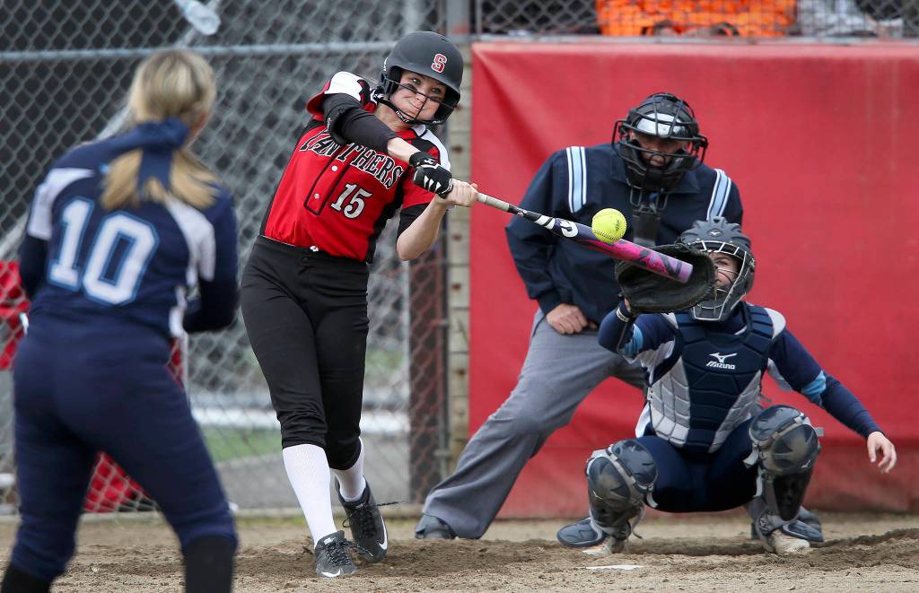 Snohomish&rsquo;s Rylie Wales blasts a two-run homer as Snohomish beat Meadowvale 16-1 in five innings of fastpitch on Tuesday, April 25, in Snohomish. (Andy Bronson / The Herald)