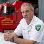 Most of the volunteers at the Darrington Fire Department have jobs out of town, Chief Denny Fenstermaker says. During a highway closure, they might decide to stay away &mdash; leaving fewer crew members in Darrington, should there be a fire. (Andy Bronson / The Herald)