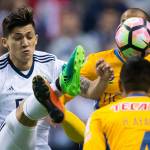 Fredy Montero of the Vancouver Whitecaps (left) and Tigres&rsquo; Guido Pizarro vie for the ball during the second leg of their CONCACAF Champions League soccer semifinal April 5 in Vancouver, British Columbia. (Darryl Dyck/The Canadian Press via AP)