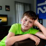 At his home in Snohomish, Jonah Urie, 11, talks about rescuing a drowning toddler this weekend at the Snohomish Aquatic Center. (Dan Bates / The Herald)