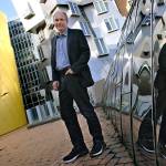 In this Monday April 3 photo, Tim Berners-Lee poses outside his office at the Massachusetts Institute of Technology in Cambridge, Massachusetts. (AP Photo/Charles Krupa)
