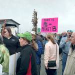 A crowd gathers for the climate march in Everett, part of a national movement. Marchers met Saturday morning near the 10th Street boat launch. (Kari Bray / The Herald)