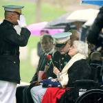 Marine Corps Commandant Gen. Robert B. Neller (left) salutes Annie Glenn, widow of John Glenn, following the American flag presentation during the graveside service for Glenn at Arlington National Cemetery in Arlington, Virginia, on Thursday, April 6. Glenn, who died Dec. 8 at age 95, was laid to rest in a private burial attended by relatives and invited guests. His family scheduled the service for what would have been John and Annie Glenn&rsquo;s 74th wedding anniversary. (U.S. Army photo by Rachel Larue/Arlington National Cemetery via AP)