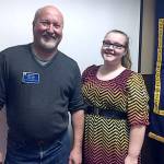 South Everett-Mukilteo Rotary Club past president Martin Cross congratulates Mariner High School&rsquo;s Victoria Philp as a Student of the Month. (Contributed photo)