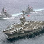 In this April 26 photo, the aircraft carrier USS Carl Vinson, foreground, transits the Philippine Sea with the Japan Maritime Self-Defense Force Atago-class guided-missile destroyer JS Ashigara (left front) and the JMSDF Murasame-class destroyer JS Samidare. The aircraft supercarrier is headed toward Korean Peninsula for an exercise with South Korea. (Mass Communication Specialist 2nd Class Sean M. Castellano/U.S. Navy via AP)