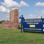 A recruiting sign for the Arkansas Department of Correction greets visitors to the Cummins Unit prison near Varner, Arkansas, which held its first execution since 2005 on Thursday, April 20. (AP Photo/Kelly P. Kissel)
