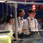 Members of Mountlake Terrace High School&rsquo;s drive team &mdash; from left, Mira Shinn, Teddy Kifelew and Mark Takasuka &mdash; work together to operate their robot and develop strategy at the FIRST Robotics Competition world championship in Houston. (Contributed photo)