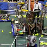 With just seconds to go, the Mountlake Terrace robot (1778) climbs a rope toward &ldquo;airship pilot&rdquo; and Chill Out team member Matt Trahms (in the team&rsquo;s uniform of white dress shirt and suspenders) to score an additional 50 points. (Contributed photo)