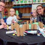 The Sheriff family, from left Scott, Van, Lee and Darcy, enjoy an art-themed fundraiser for The Moyer Foundation at The Goddard School, a Snohomish preschool. (Contributed photo)